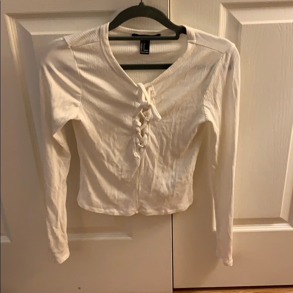 White long sleeve lace up top